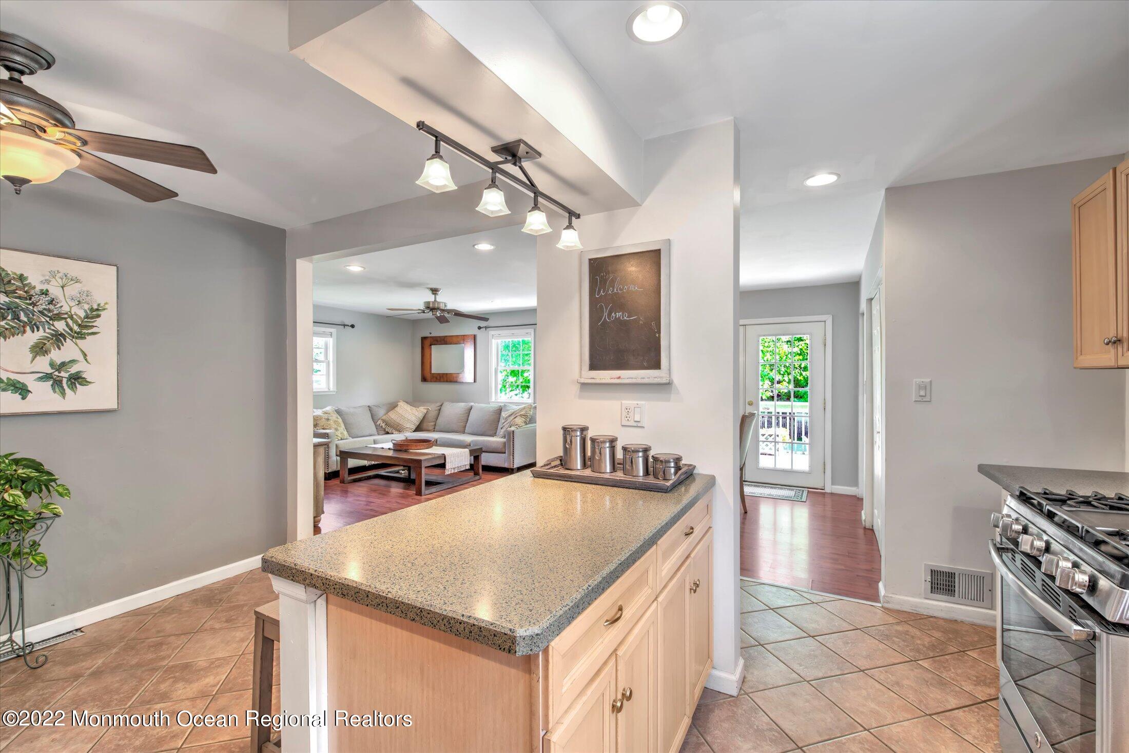 216 West Prospect Avenue Keyport, NJ 07735 - Photo 17 of 47 a kitchen with stainless steel appliances granite countertop a sink a stove and a refrigerator