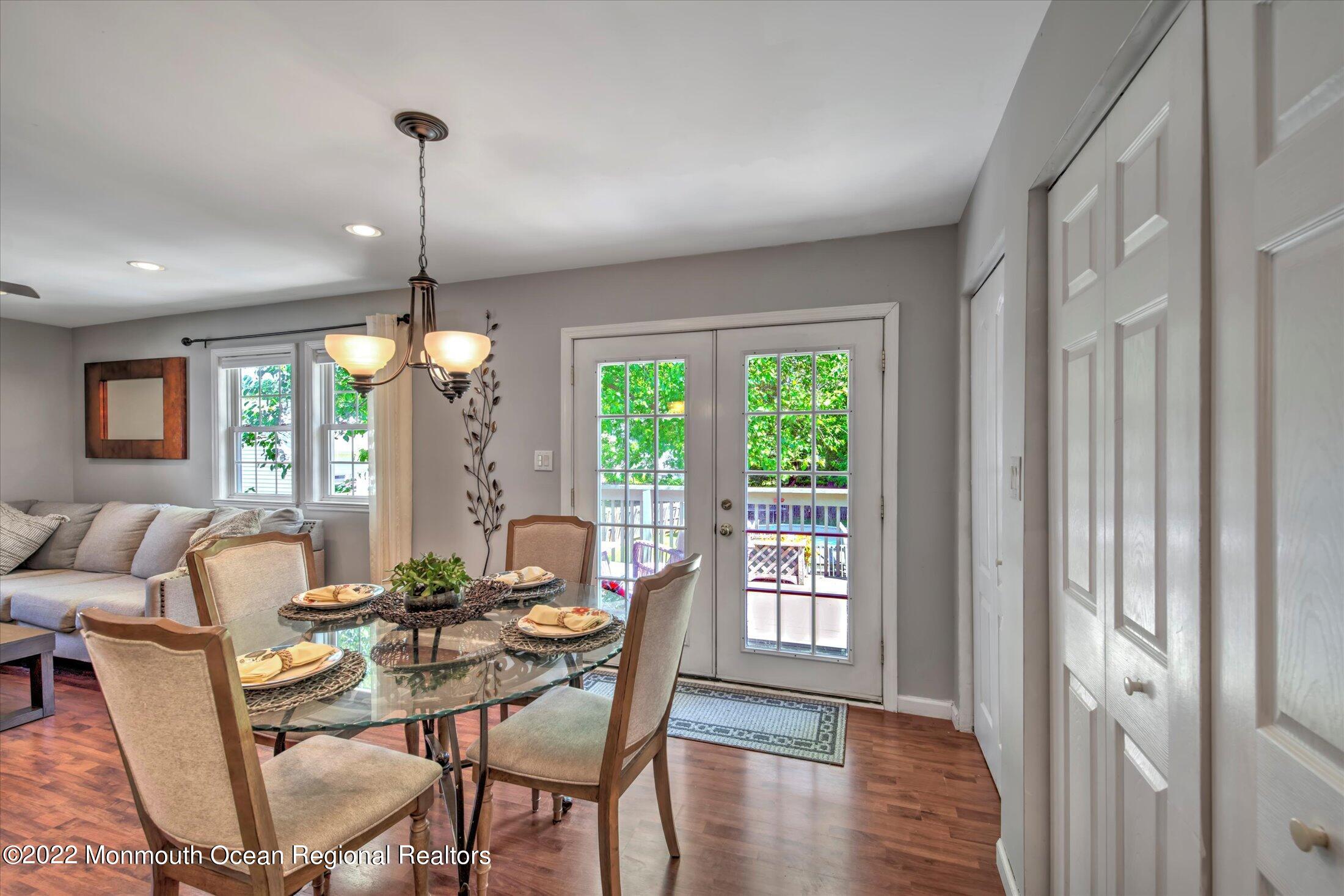 216 West Prospect Avenue Keyport, NJ 07735 - Photo 22 of 47 a view of a dining room with furniture window and wooden floor