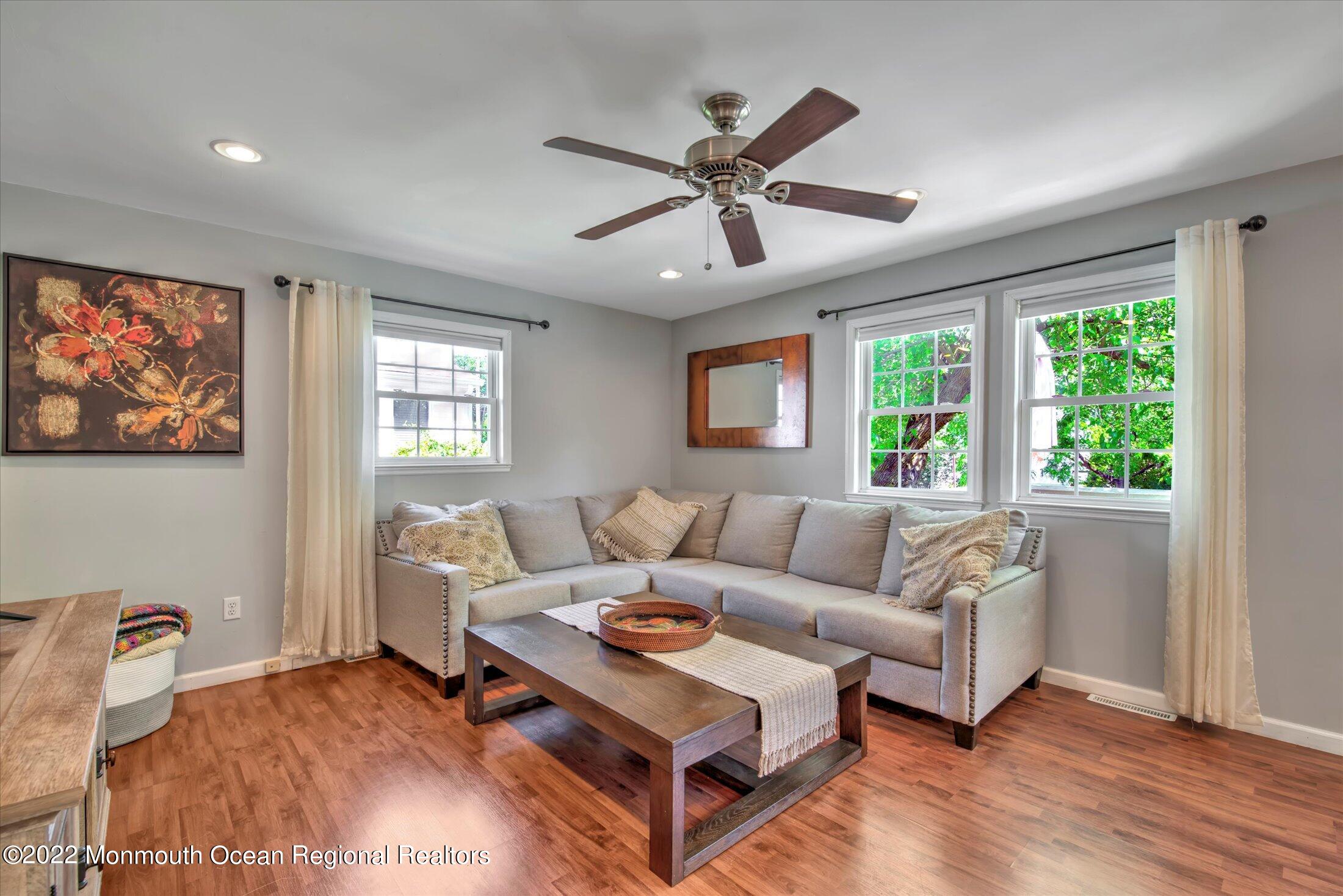 216 West Prospect Avenue Keyport, NJ 07735 - Photo 25 of 47 a living room with furniture and a large window