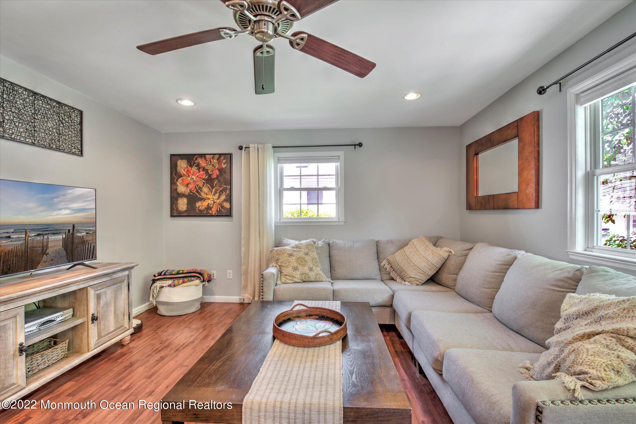 216 West Prospect Avenue Keyport, NJ 07735 - Photo 26 of 47 a living room with furniture and a flat screen tv