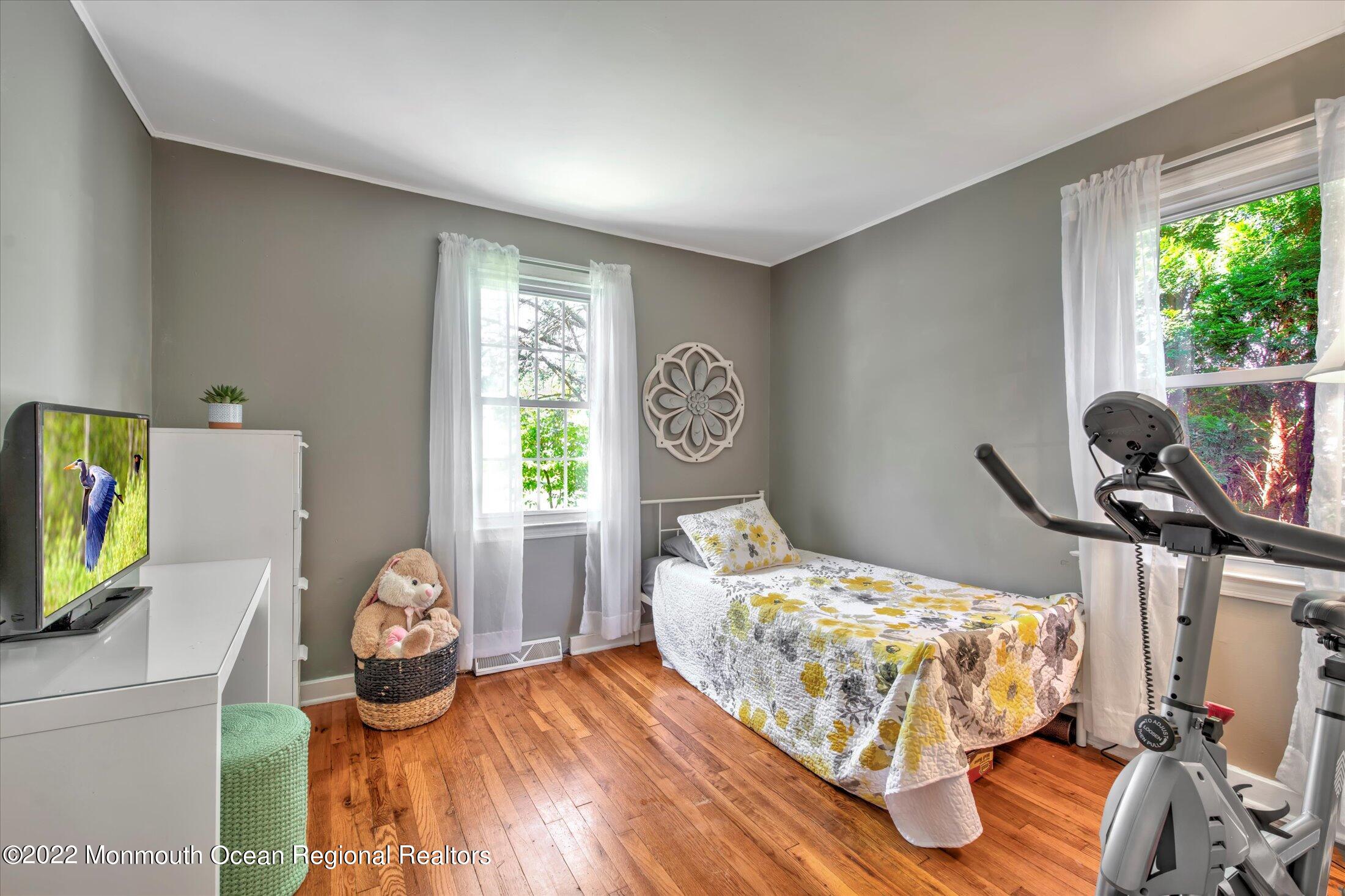 216 West Prospect Avenue Keyport, NJ 07735 - Photo 30 of 47 a bedroom with a bed and a window