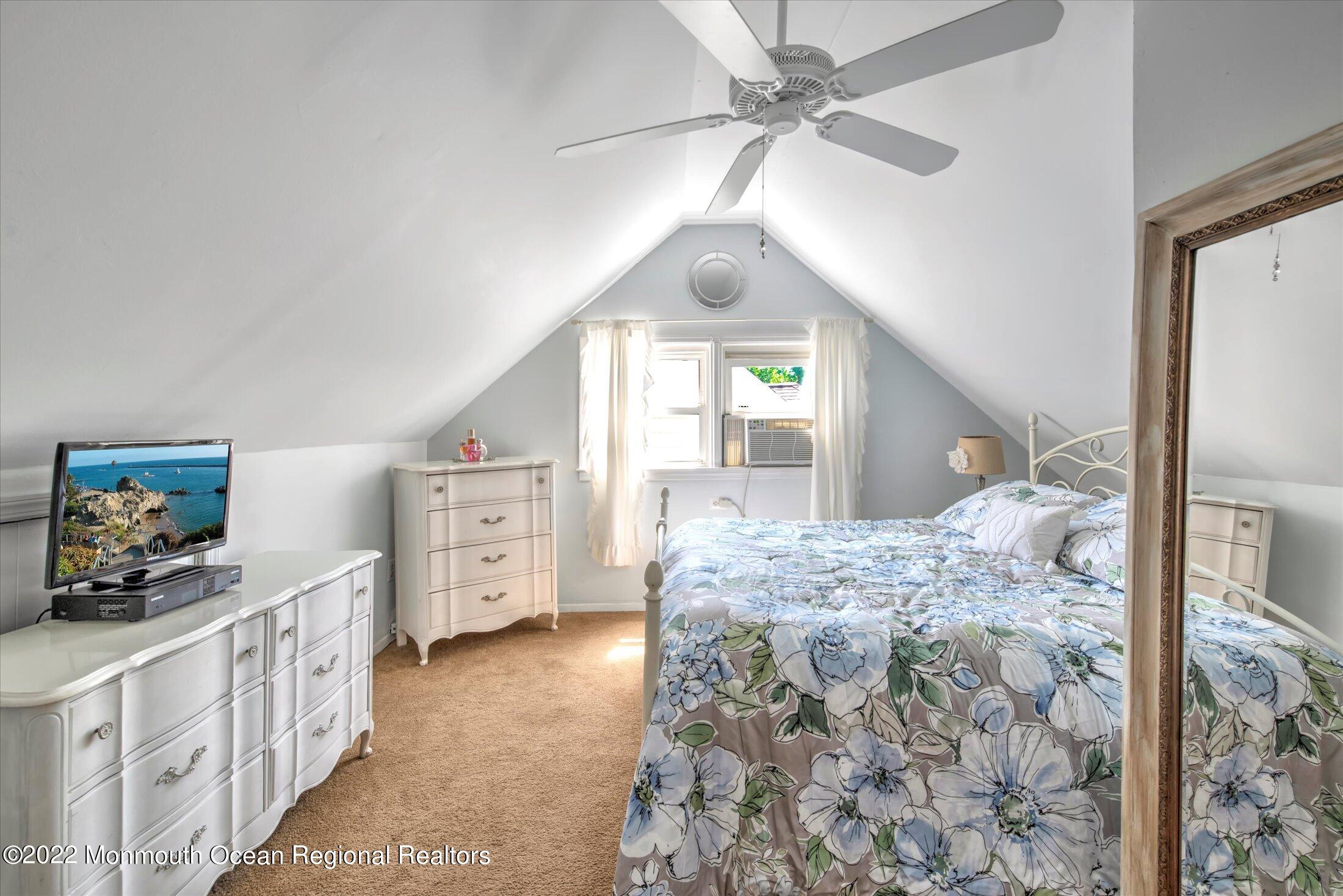 216 West Prospect Avenue Keyport, NJ 07735 - Photo 33 of 47 a view of a bedroom with furniture and windows