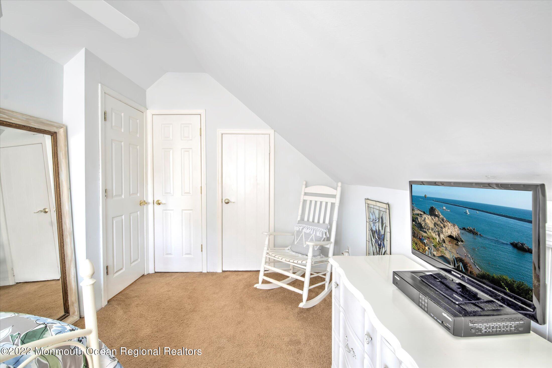 216 West Prospect Avenue Keyport, NJ 07735 - Photo 35 of 47 a bedroom with a bed and a flat screen tv