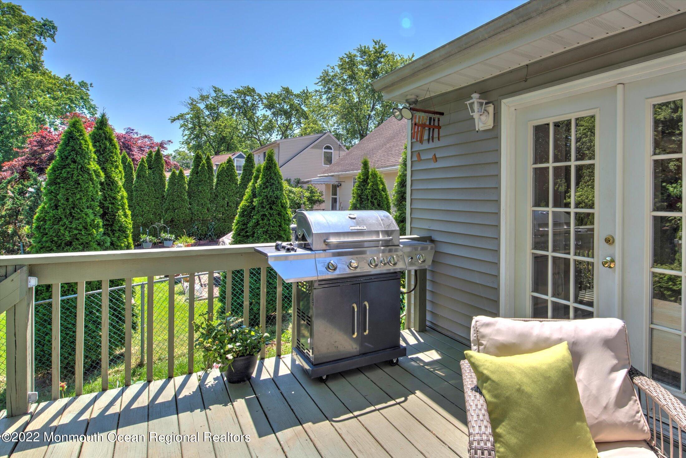 216 West Prospect Avenue Keyport, NJ 07735 - Photo 38 of 47 a view of a chair and tables in the balcony