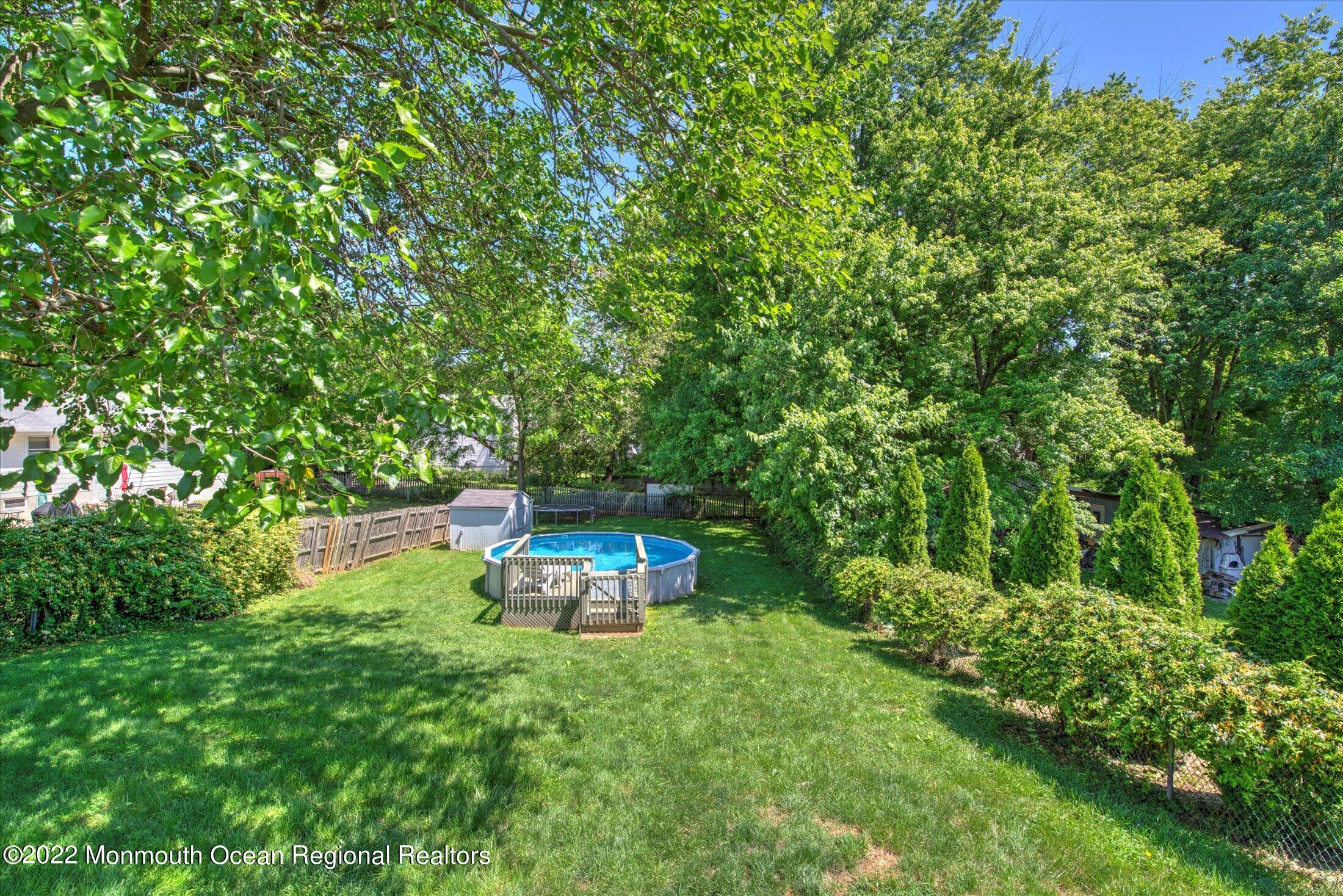 216 West Prospect Avenue Keyport, NJ 07735 - Photo 42 of 47 a backyard of a house with outdoor seating and green space
