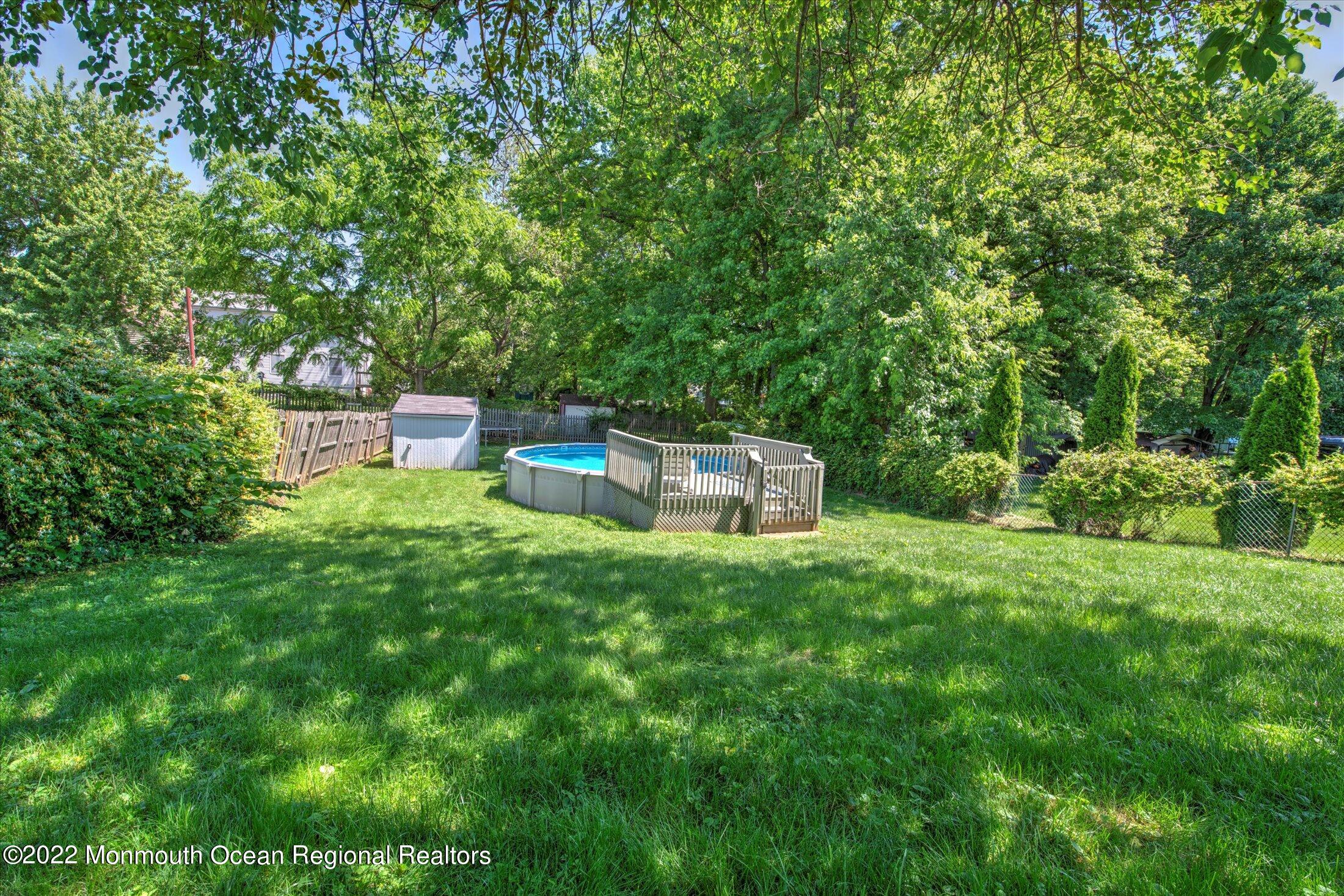 216 West Prospect Avenue Keyport, NJ 07735 - Photo 43 of 47 a backyard of a house with table and chairs