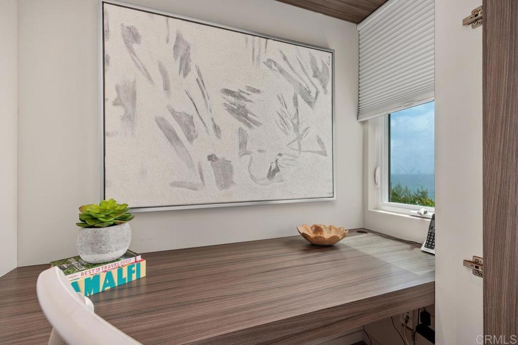 1856 Parliament Road Encinitas, CA 92024 - Photo 24 of 42 a view of a room with furniture and flower pot