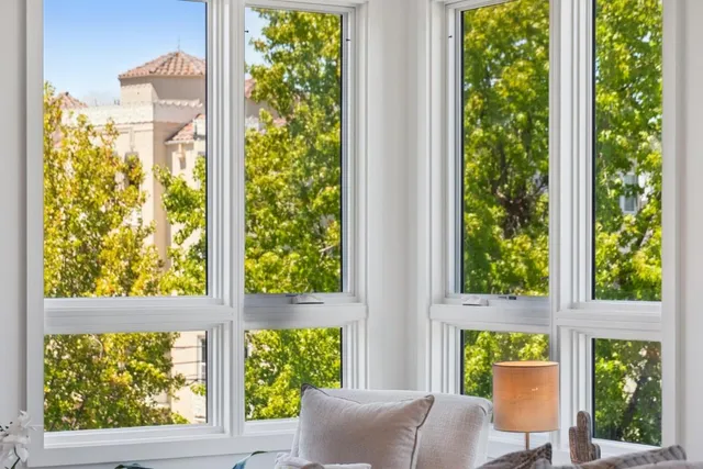 a living room with furniture and a table