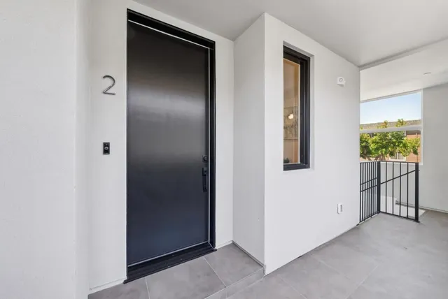 a bedroom with a bed and a table in it