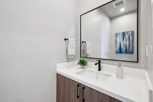 a view of a terrace with couches and potted plants