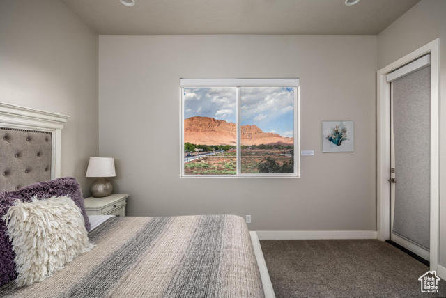 2600 Ocotillo Way, Unit 34 Santa Clara, UT 84765 - Photo 35 of 43 Bedroom with a mountain view, carpet floors, and recessed lighting