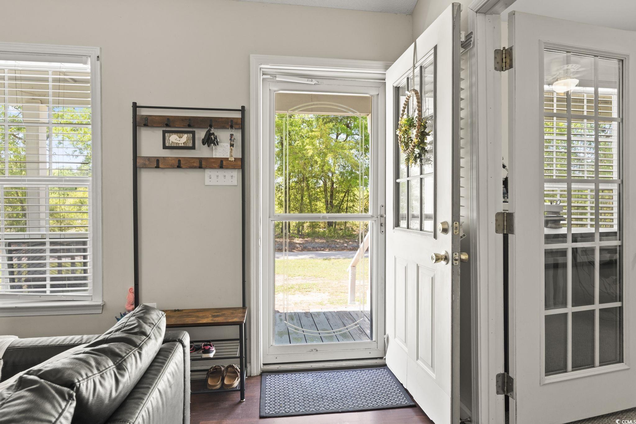 7530 Maple Swamp Road Gresham, SC 29546 - Photo 2 of 40 Doorway with dark wood-style flooring and a health