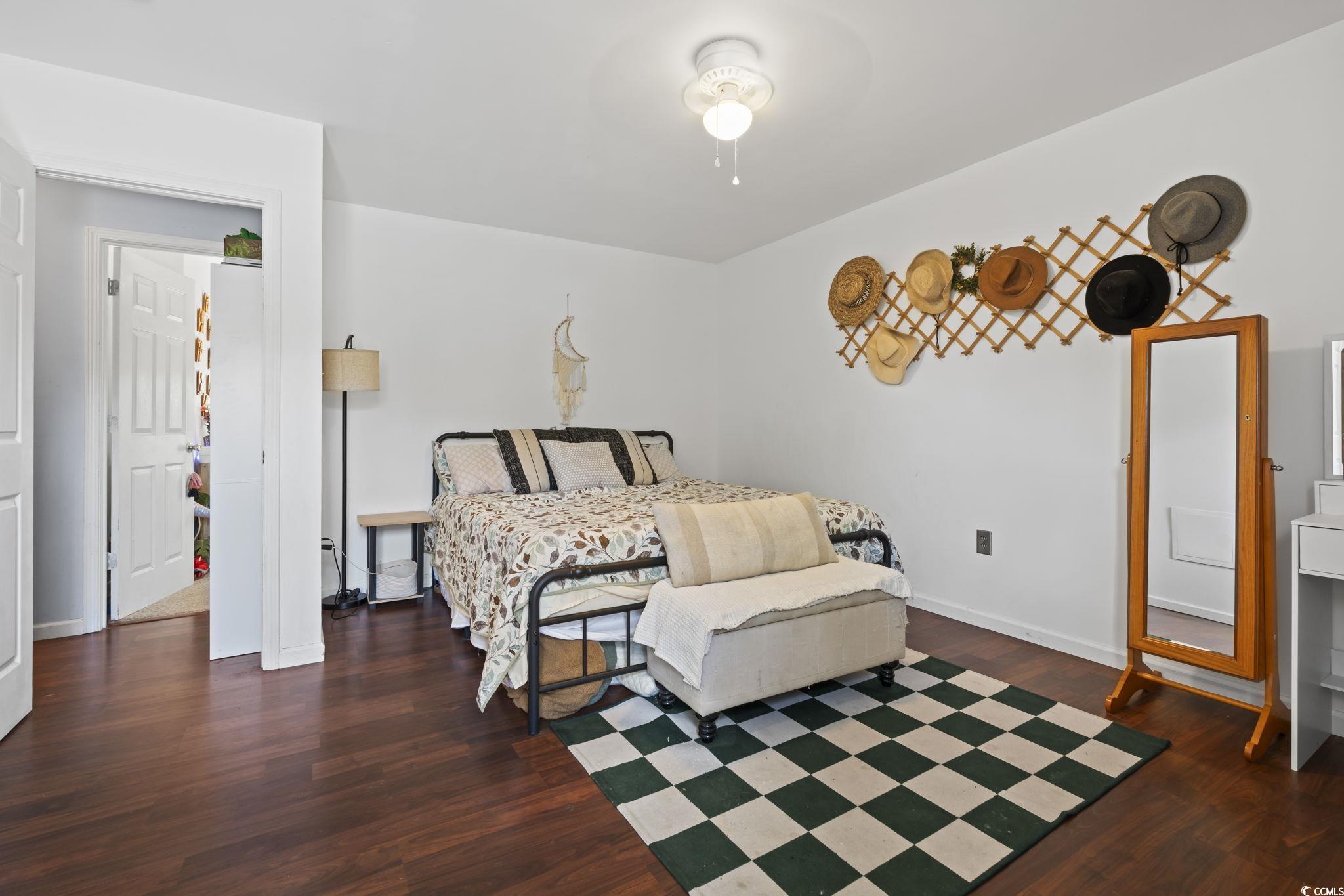 7530 Maple Swamp Road Gresham, SC 29546 - Photo 23 of 40 Bedroom with baseboards and wood finished floors