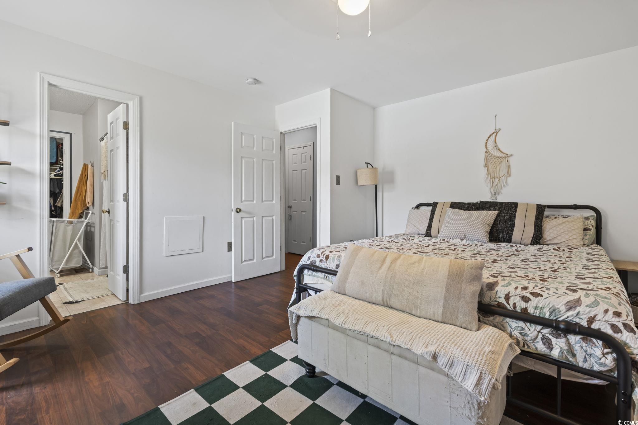 7530 Maple Swamp Road Gresham, SC 29546 - Photo 24 of 40 Bedroom with baseboards and wood finished floors