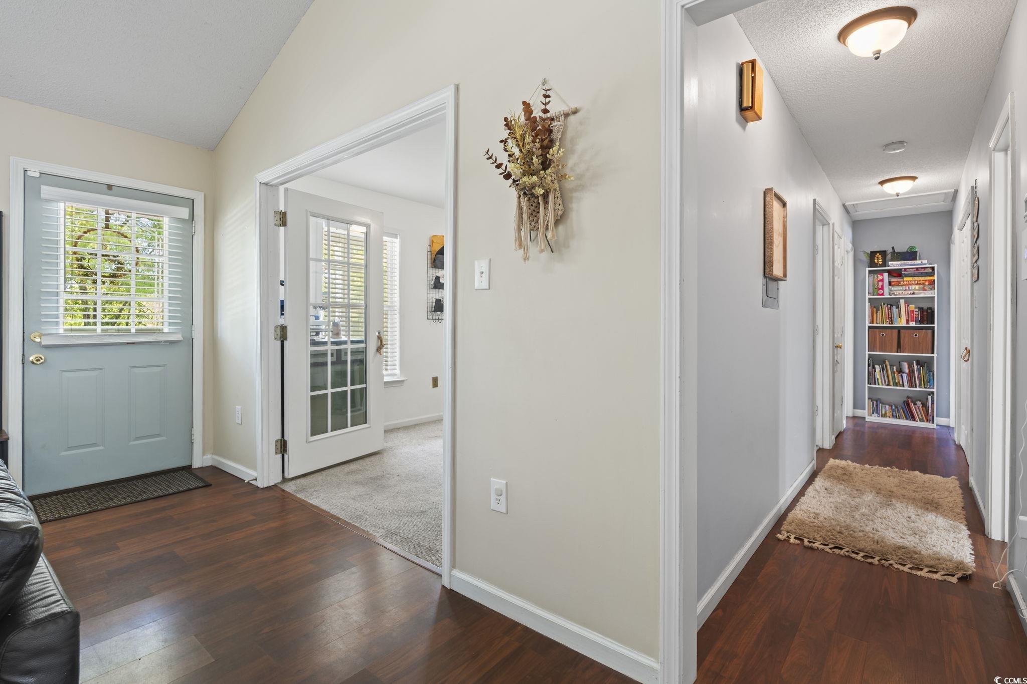 7530 Maple Swamp Road Gresham, SC 29546 - Photo 30 of 40 Foyer with baseboards, vaulted ceiling, and wood f
