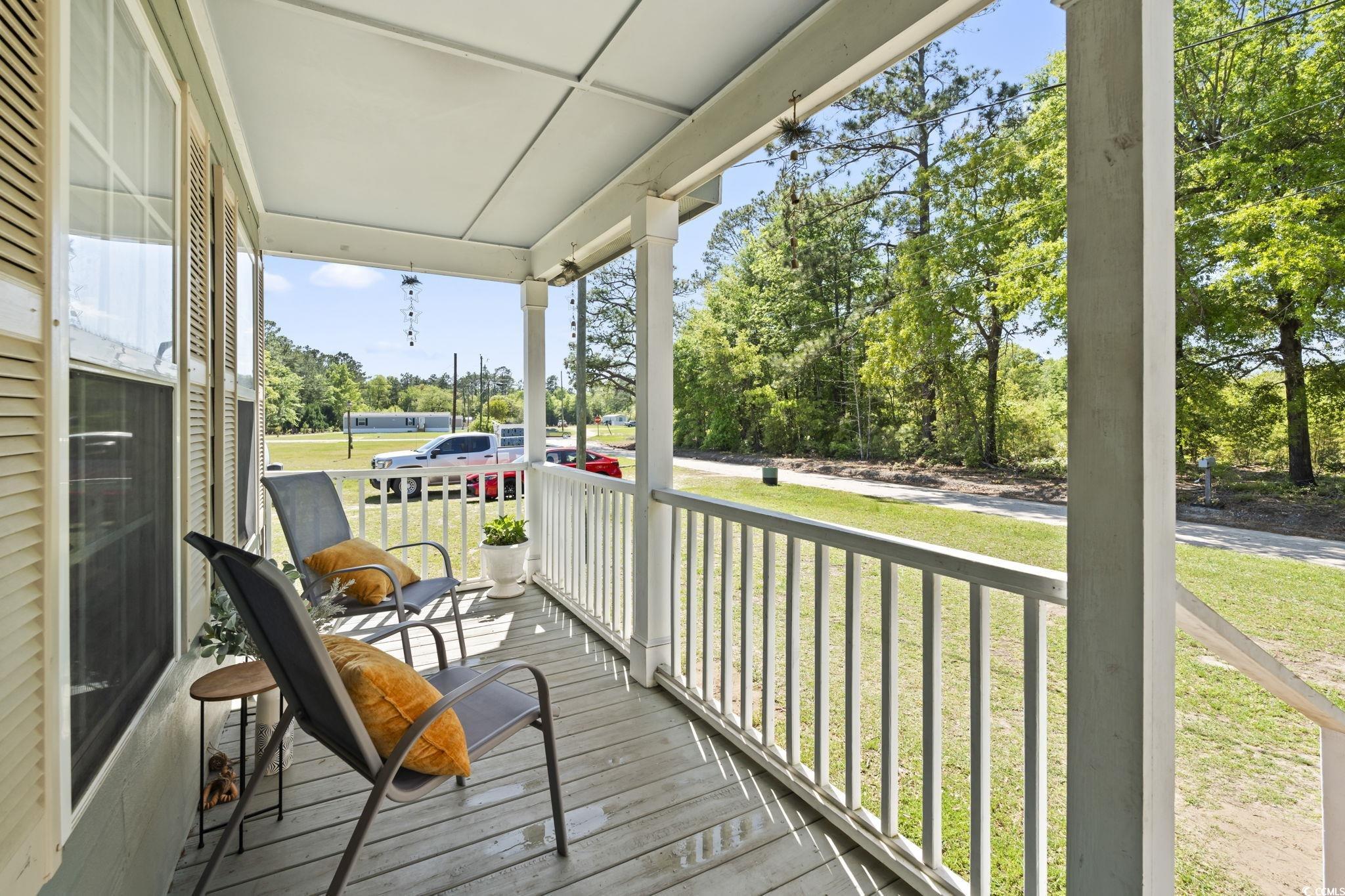 7530 Maple Swamp Road Gresham, SC 29546 - Photo 31 of 40 Deck featuring a yard and a porch