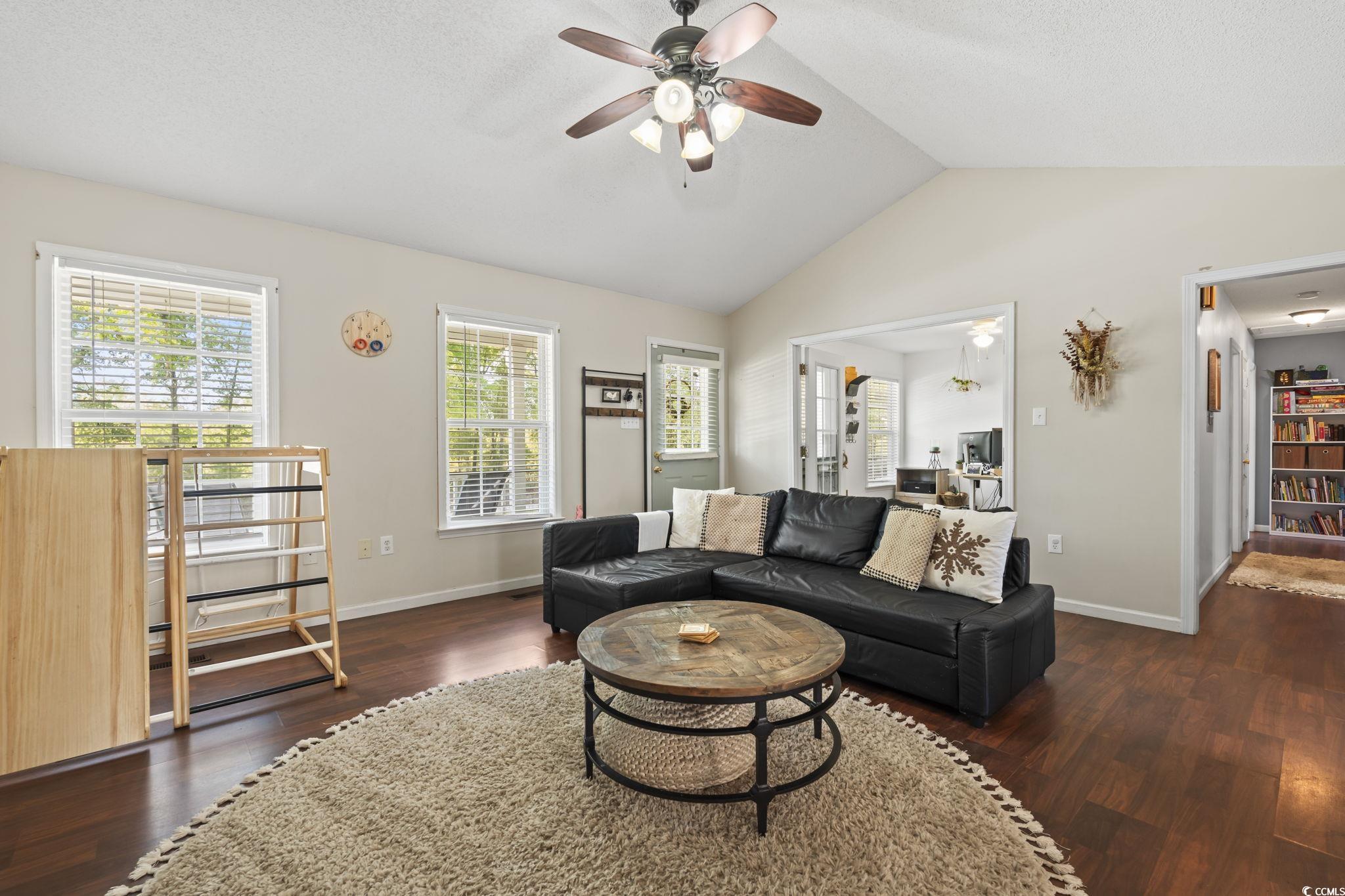 7530 Maple Swamp Road Gresham, SC 29546 - Photo 5 of 40 Living room featuring baseboards, a ceiling fan, w
