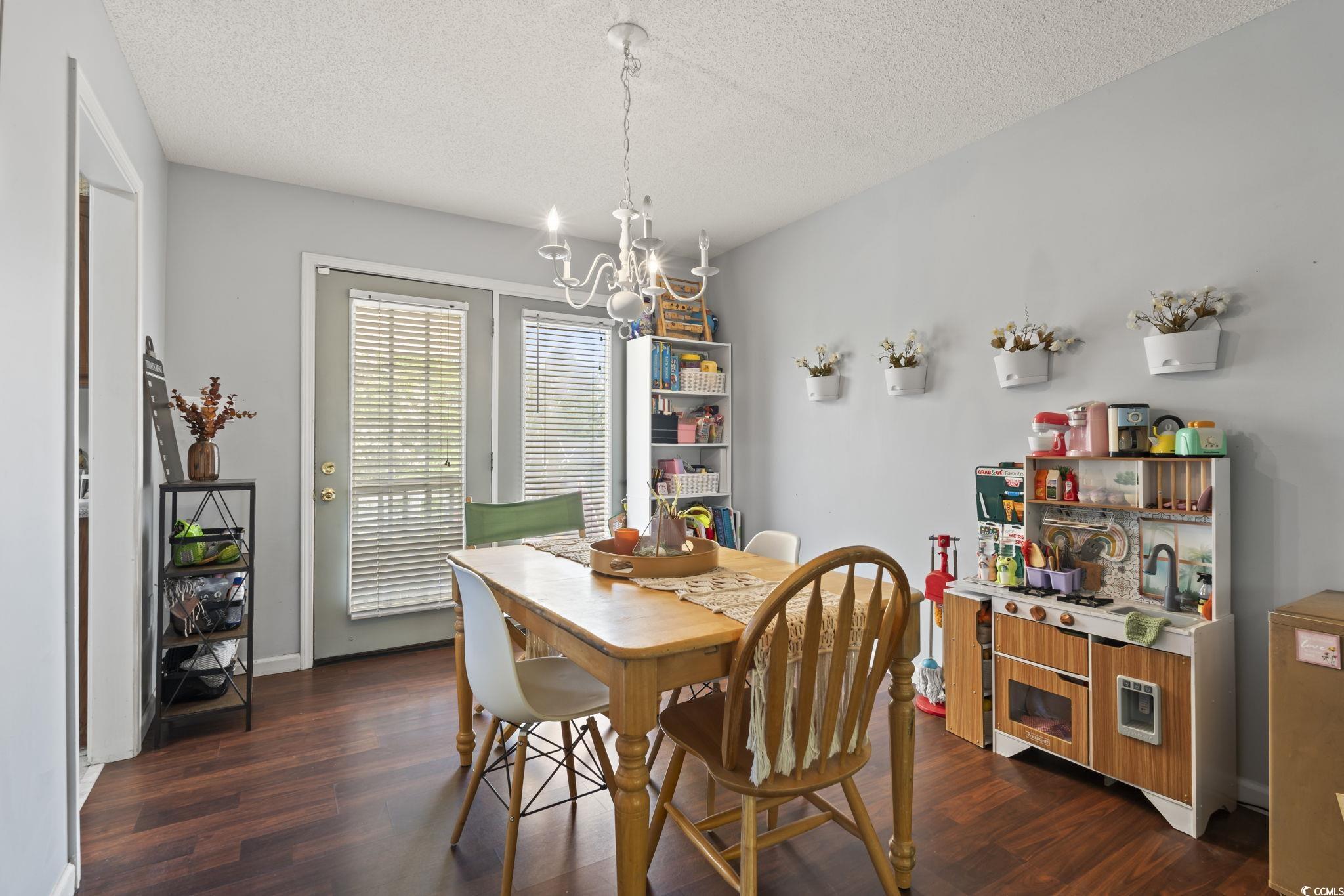 7530 Maple Swamp Road Gresham, SC 29546 - Photo 6 of 40 Dining area featuring a textured ceiling, a notabl