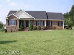 7411 Friendship Church Road Browns Summit, NC 27214 - Photo 1 of 6 Exterior Front.