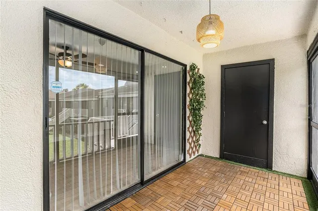 a view of a room with a large window