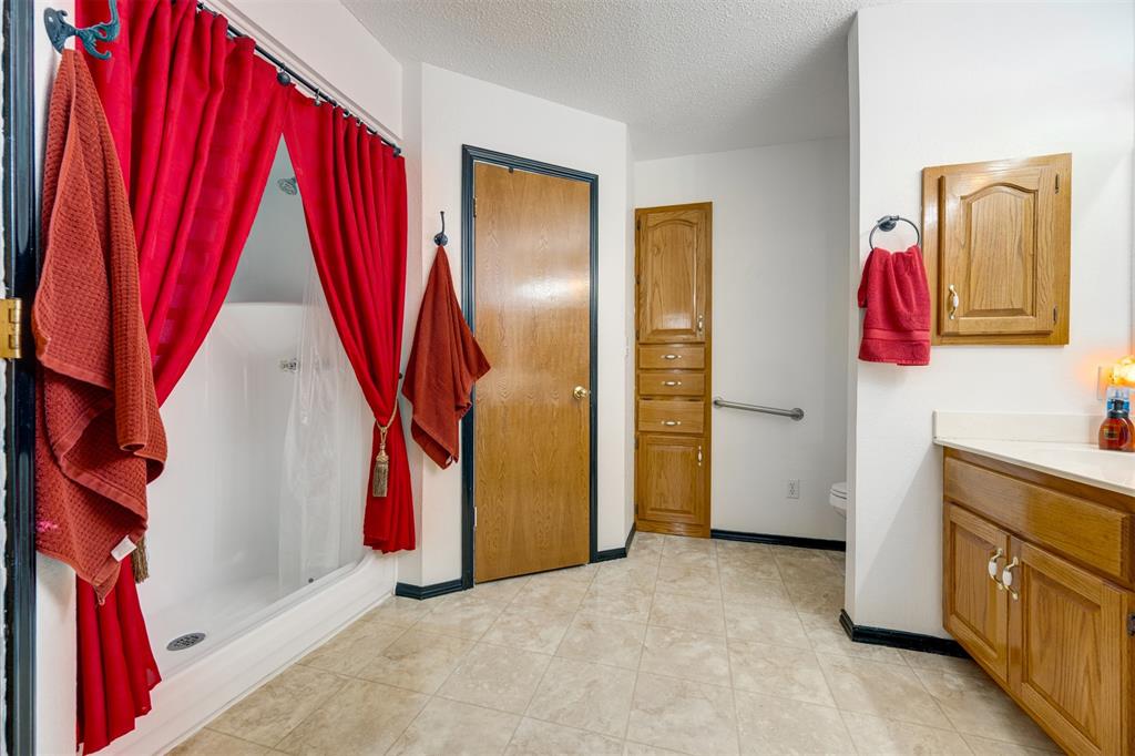 1876 Farm To Market 906 Powderly, TX 75473 - Photo 18 of 38 a view of a bedroom with baby toys