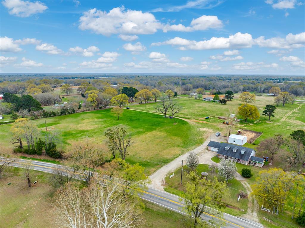 1876 Farm To Market 906 Powderly, TX 75473 - Photo 31 of 38 a view of a lake with a yard