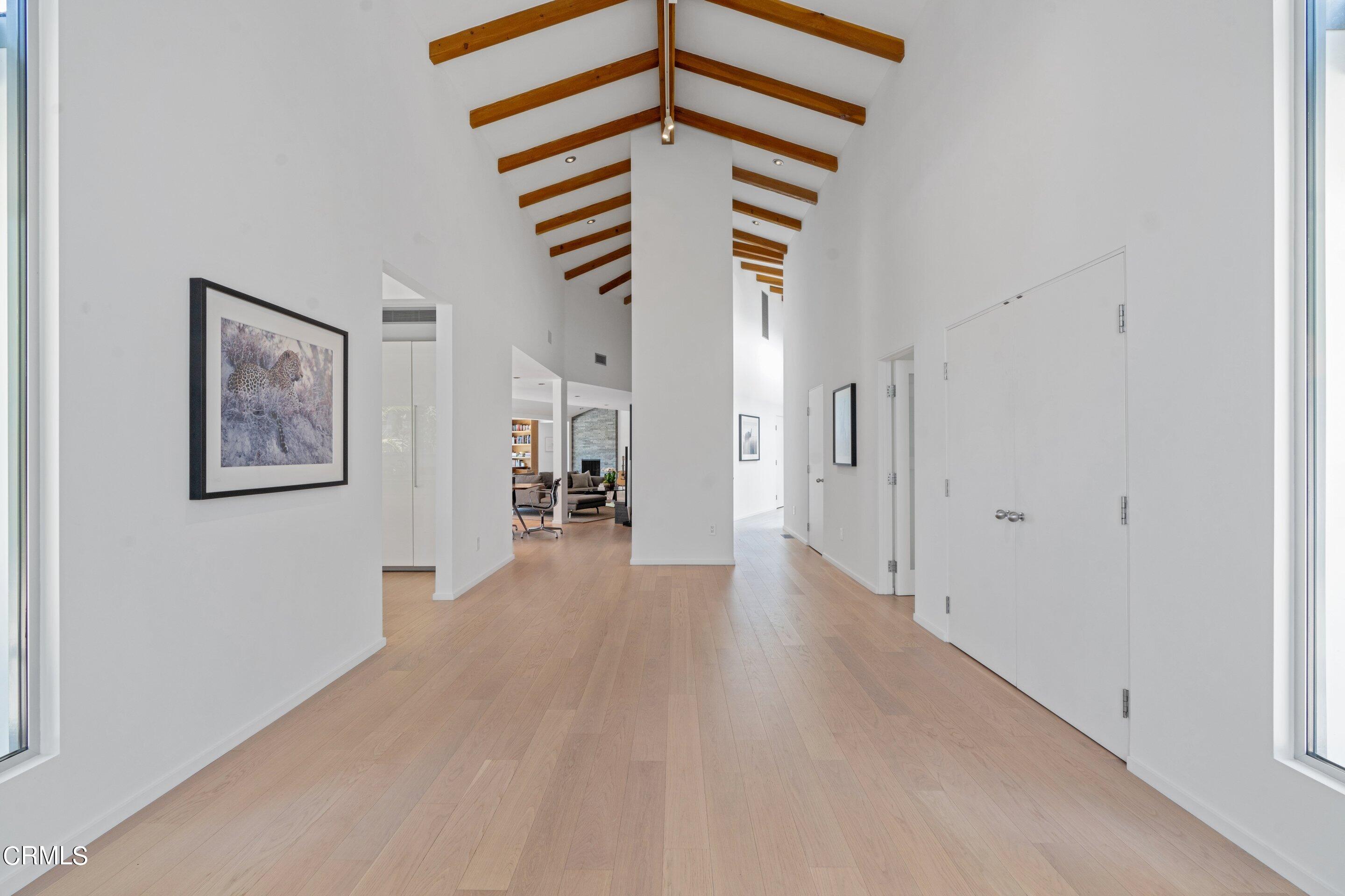 1460 Linda Ridge Road Pasadena, CA 91105 - Photo 11 of 63 a view of a hallway with a white walls