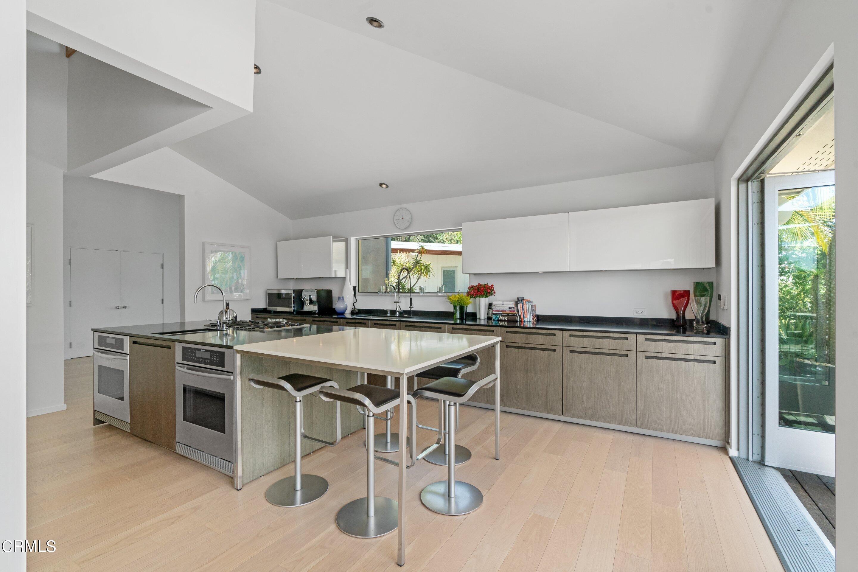 1460 Linda Ridge Road Pasadena, CA 91105 - Photo 15 of 63 a kitchen with a stove a sink dishwasher and a refrigerator