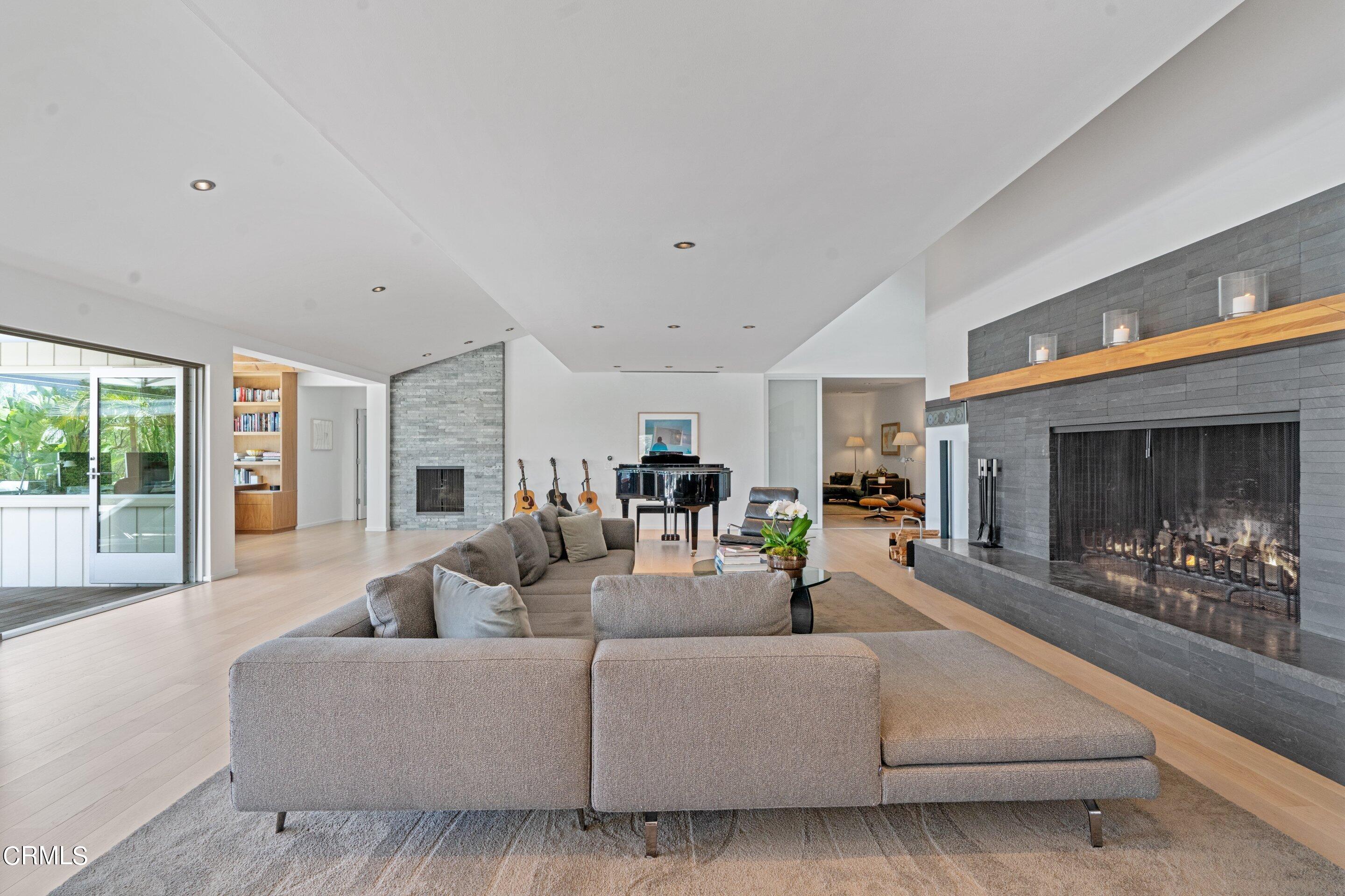 1460 Linda Ridge Road Pasadena, CA 91105 - Photo 18 of 63 a living room with furniture and a fireplace
