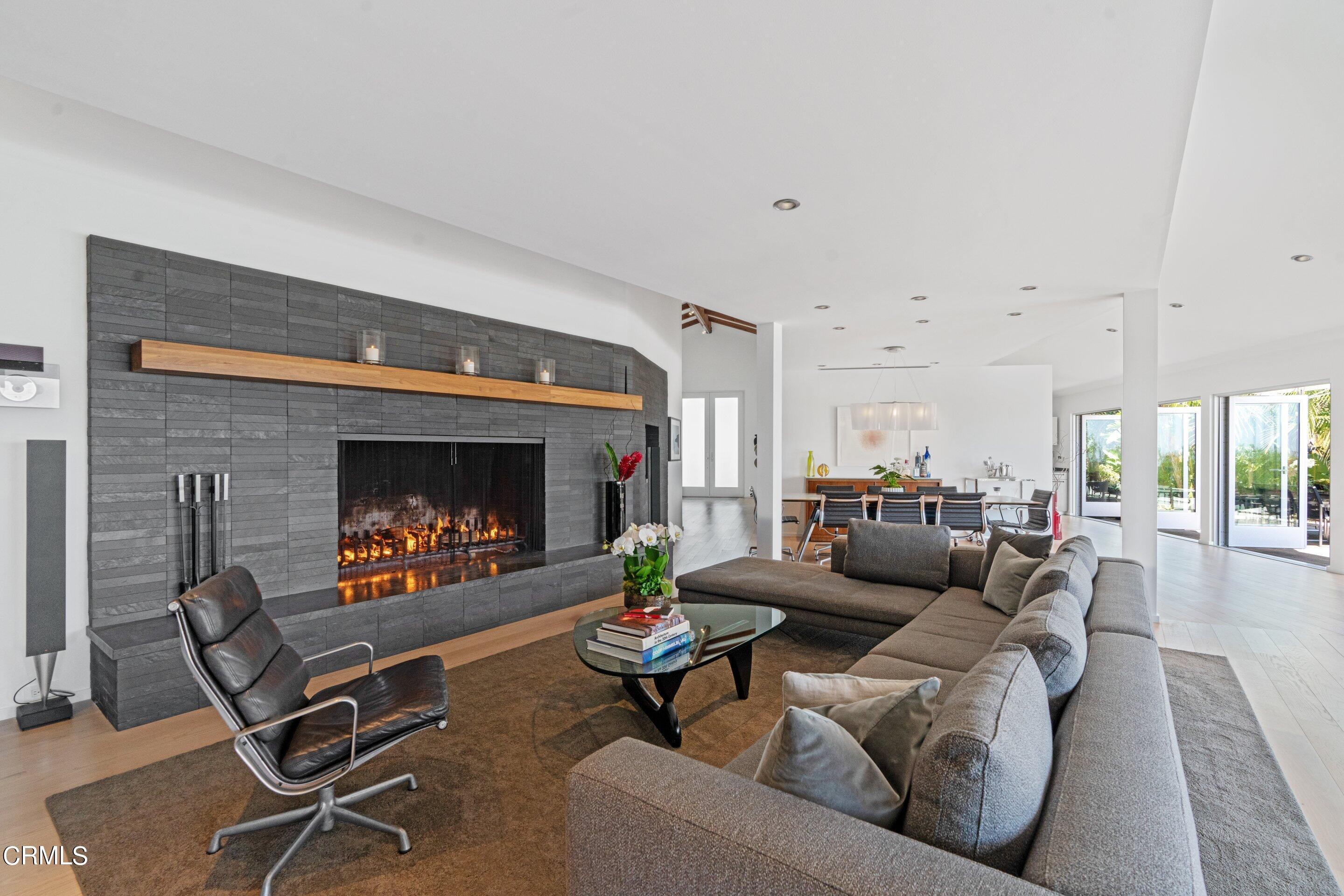 1460 Linda Ridge Road Pasadena, CA 91105 - Photo 21 of 63 a living room with furniture and a fireplace