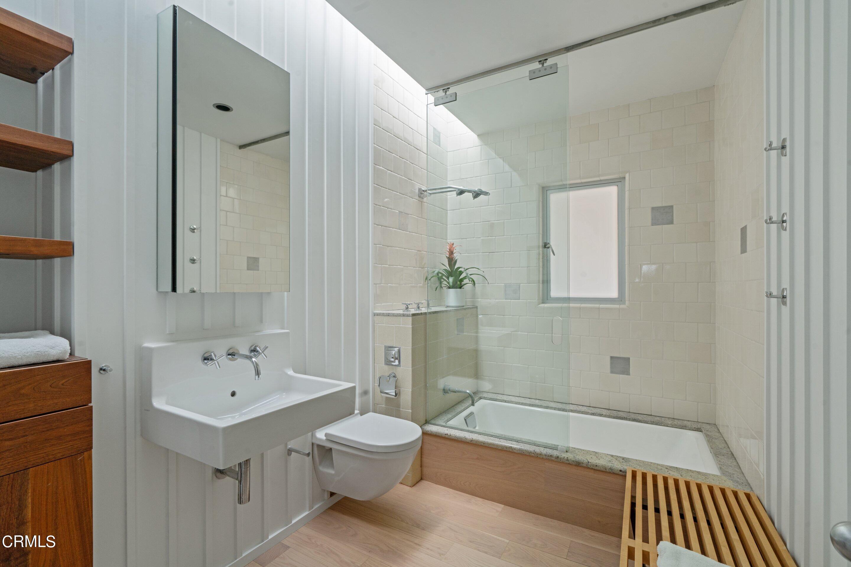 1460 Linda Ridge Road Pasadena, CA 91105 - Photo 38 of 63 a bathroom with a sink a toilet and shower