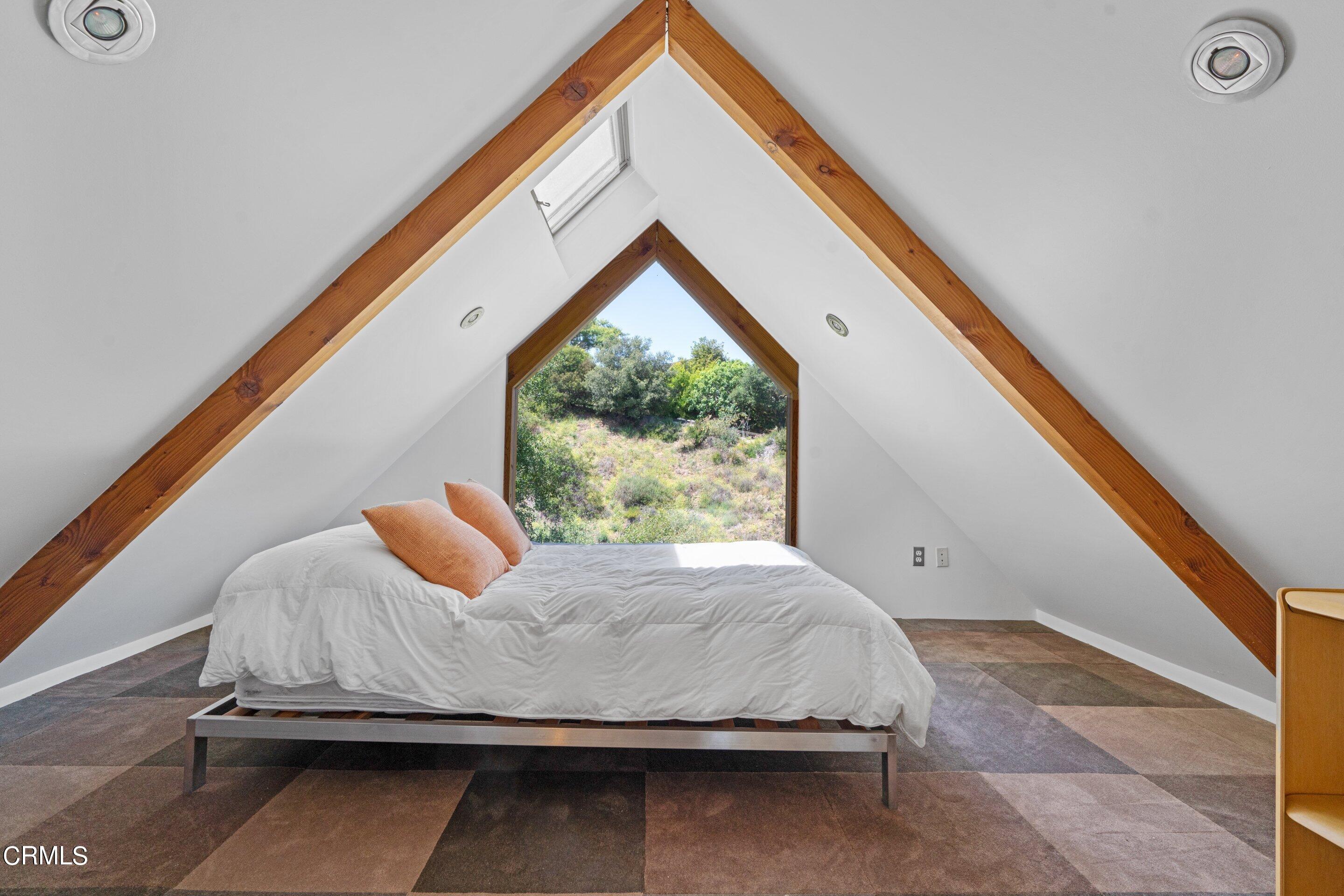 1460 Linda Ridge Road Pasadena, CA 91105 - Photo 47 of 63 a bedroom with a bed and window