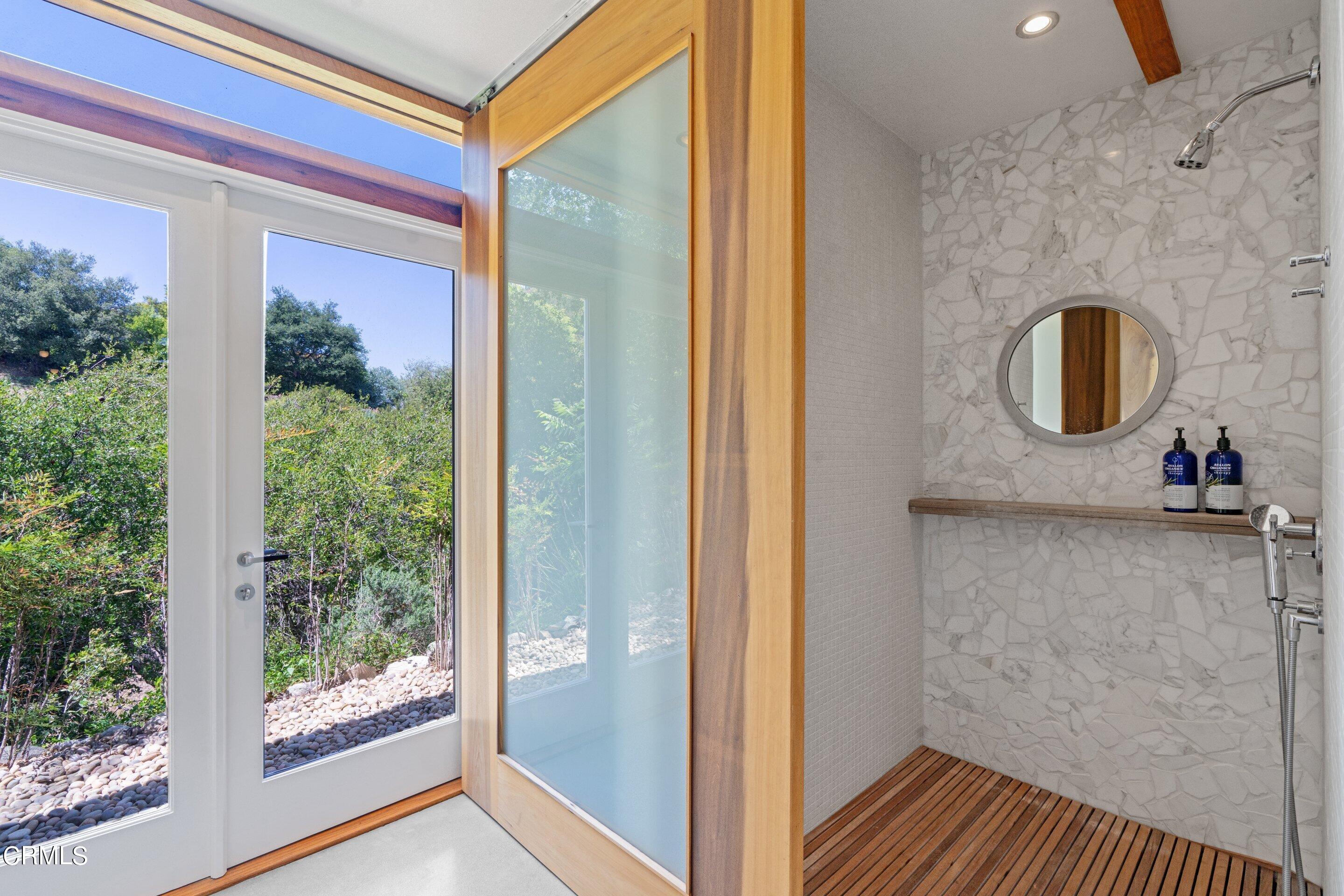 1460 Linda Ridge Road Pasadena, CA 91105 - Photo 49 of 63 a view of bathroom with a shower and a mirror