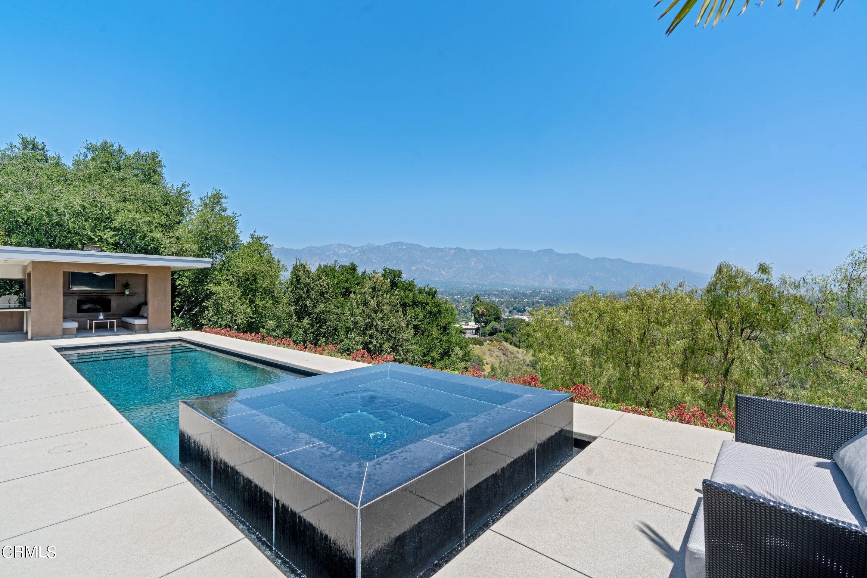 1460 Linda Ridge Road Pasadena, CA 91105 - Photo 54 of 63 a view of a swimming pool with a patio