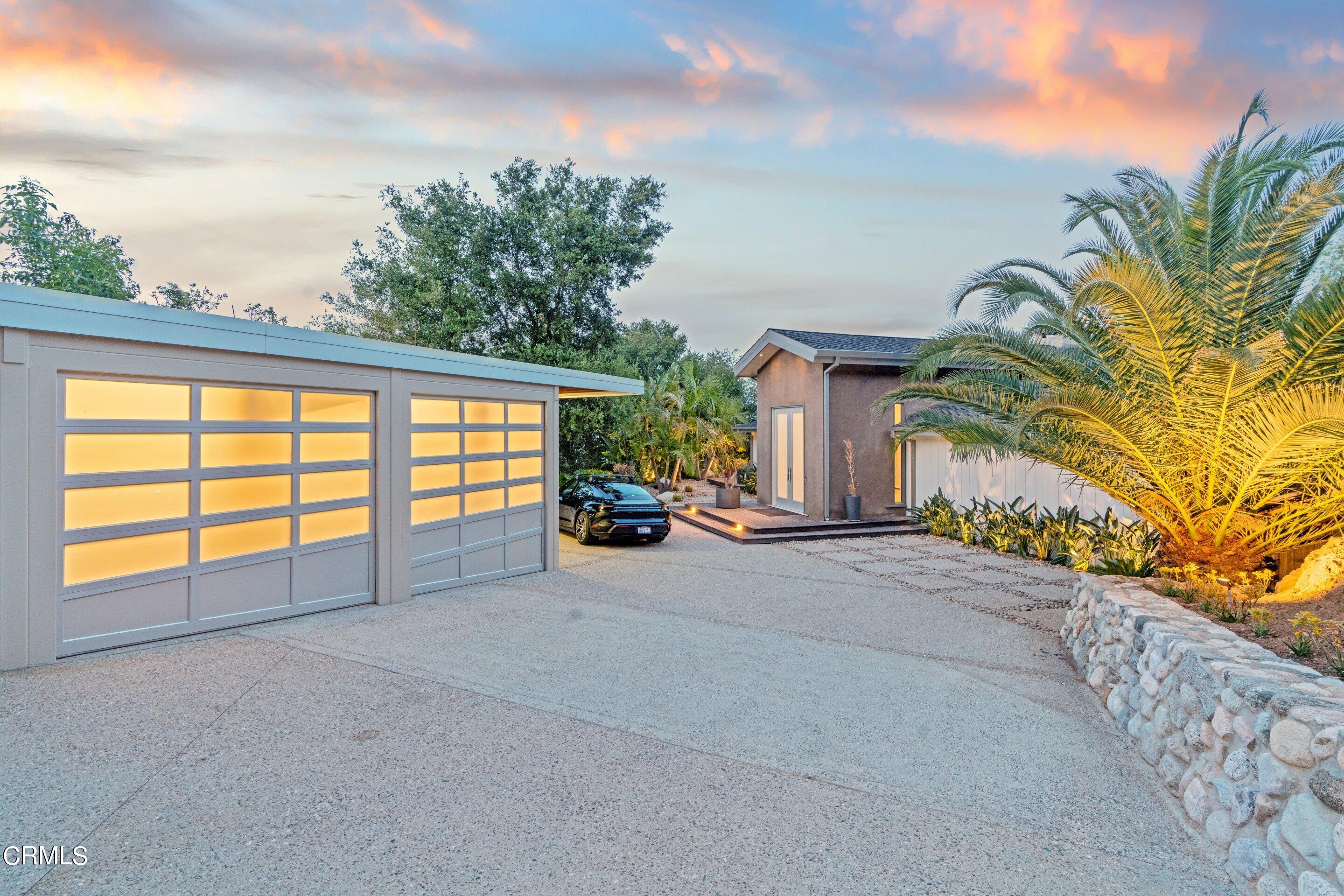 1460 Linda Ridge Road Pasadena, CA 91105 - Photo 60 of 63 a view of a house with a patio and a yard