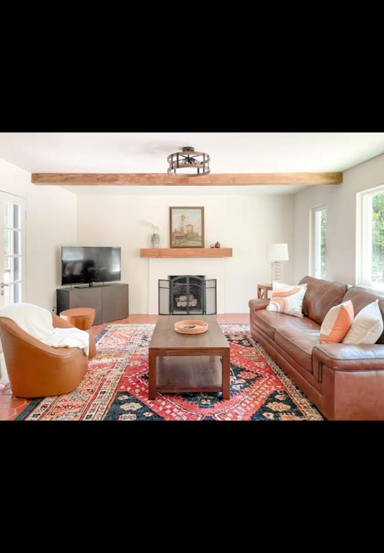 758 Rs County Road 1490 Point, TX 75472 - Photo 2 of 9 a living room with furniture and a fireplace