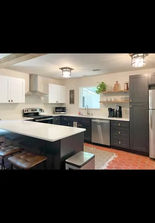 a view of a living room and dining room