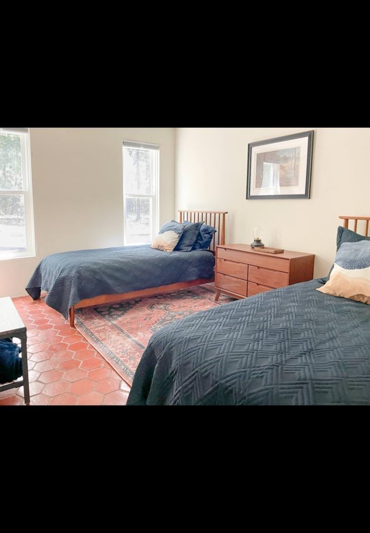758 Rs County Road 1490 Point, TX 75472 - Photo 8 of 9 a view of a bedroom with furniture and window