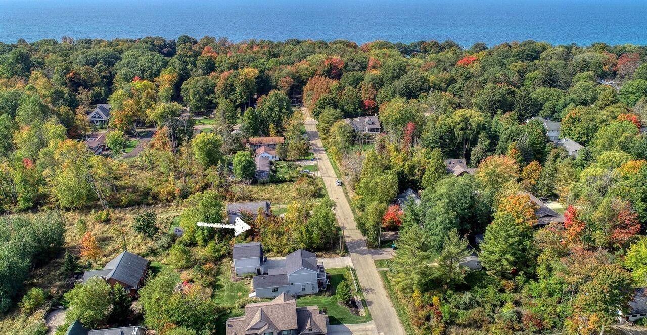 6912 3rd Street Douglas, MI 49406 - Photo 8 of 17 drone side exposure
