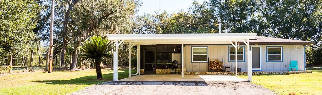 2929 North Valrico Road Seffner, FL 33584 - Photo 1 of 1 a view of a house with a swimming pool