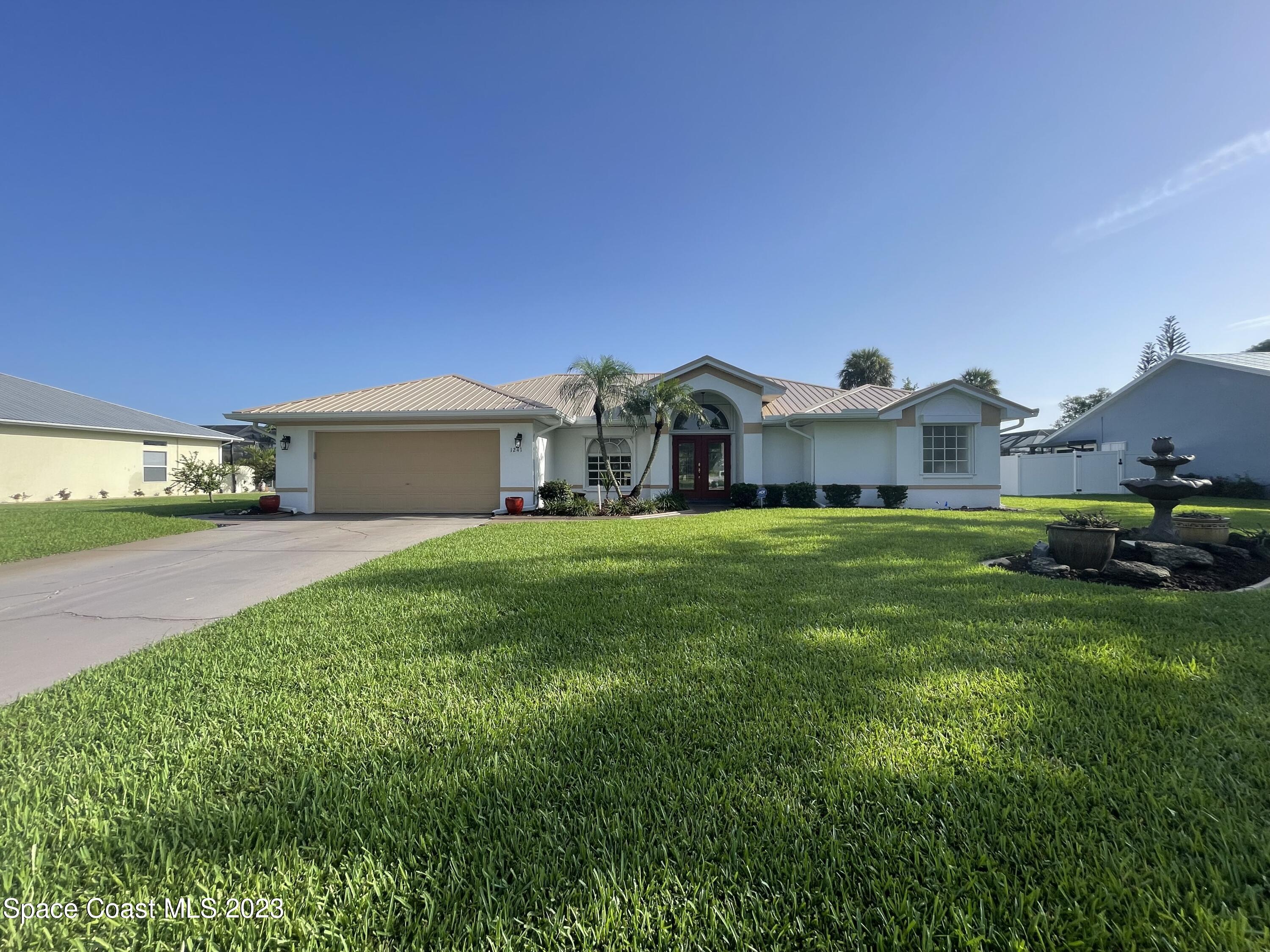 1241 Meadowbrook Road Northeast Palm Bay, FL 32905 - Photo 1 of 41 IMG_6007