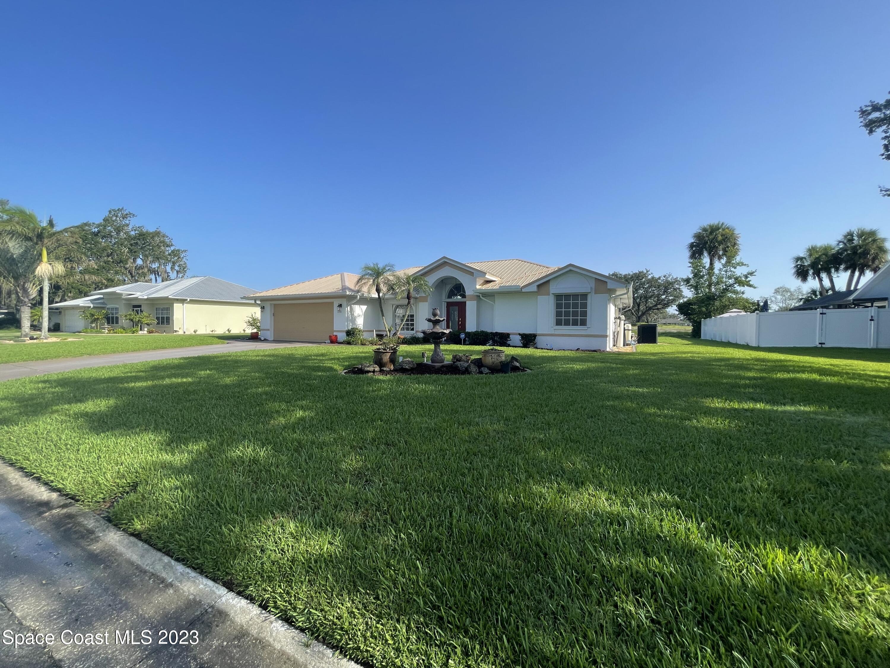 1241 Meadowbrook Road Northeast Palm Bay, FL 32905 - Photo 3 of 41 IMG_6009