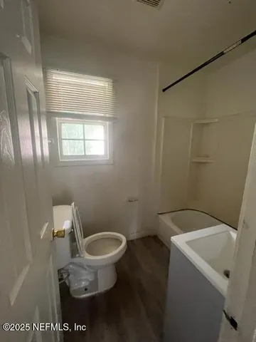 a bathroom with a sink and a toilet