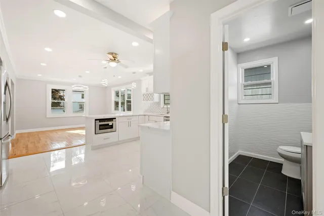 a bathroom with a sink a toilet and a bathtub