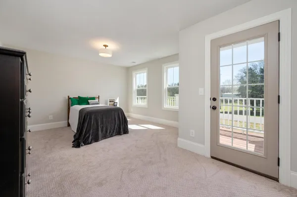 a view of a hallway view with staircase