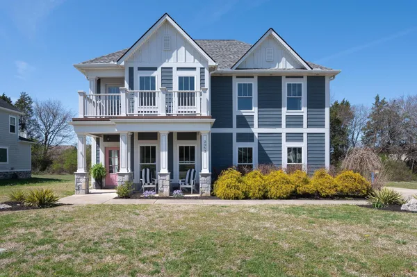 a front view of a house with natural light