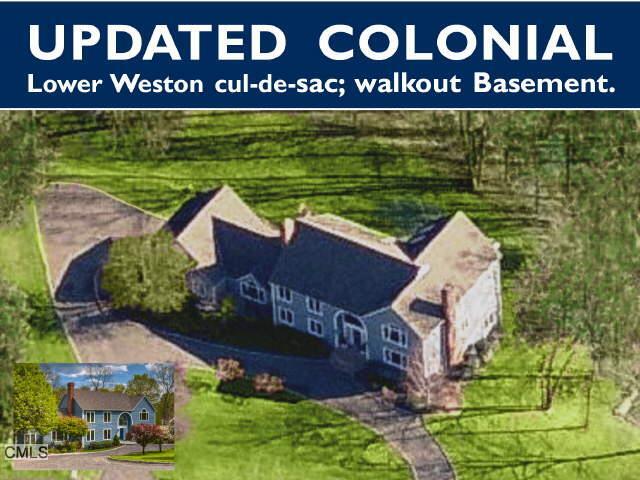 7 Soundview Farm Road Weston, CT 06883 - Photo 1 of 1 a sign that is sitting on a brick wall