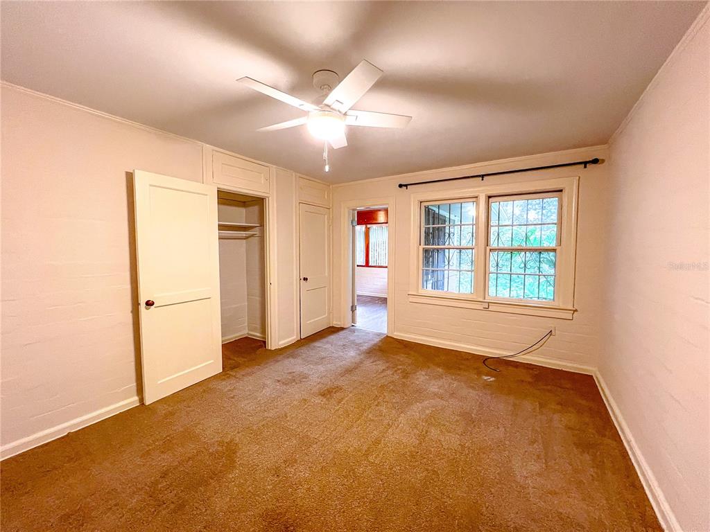 1403 Northwest 11th Road Gainesville, FL 32605 - Photo 14 of 15 a view of an empty room with a window