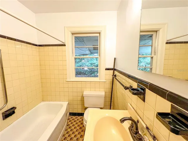 a bathroom with a sink and bathtub