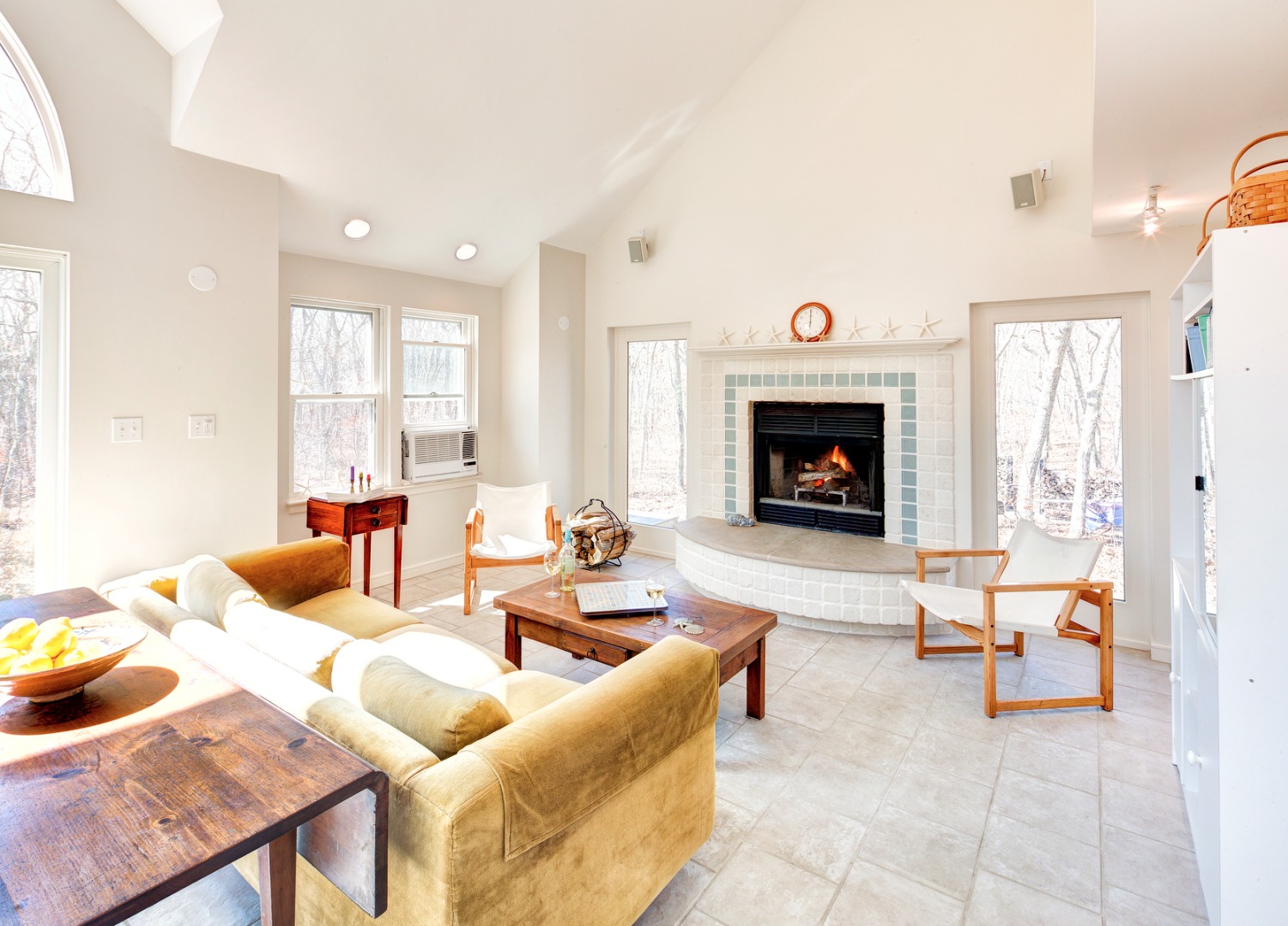 11 North Roger Road Edgartown, MA 02539 - Photo 3 of 21 a living room with furniture a fireplace and a large window